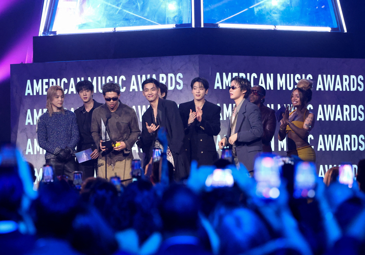 BTS at the 2026 AMA podium